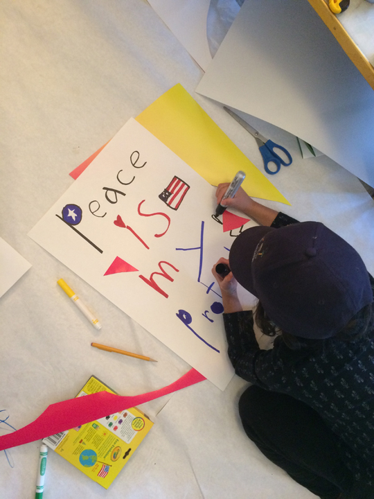 8 year old Elle WInship gets in on the action "Peace is my Protest"